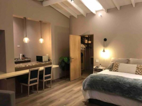 Apto BR Suites 6 min de Provenza, encanto natural